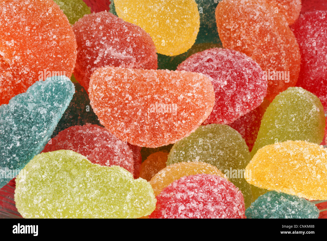 Assorted shaped and flavored fruit jellies background Stock Photo Alamy