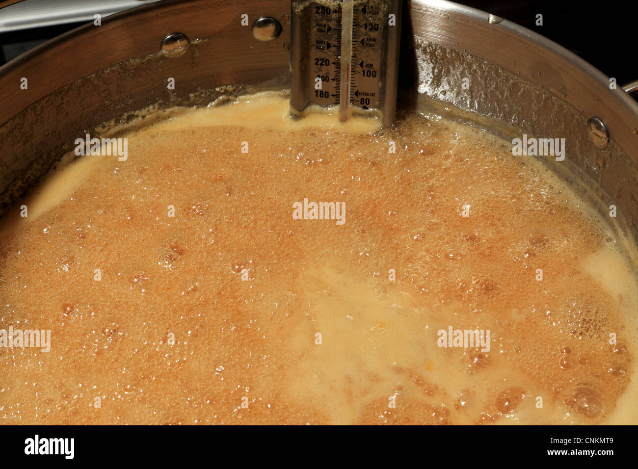 3736. Marmalade making, rolling boil at 106c Stock Photo - Alamy