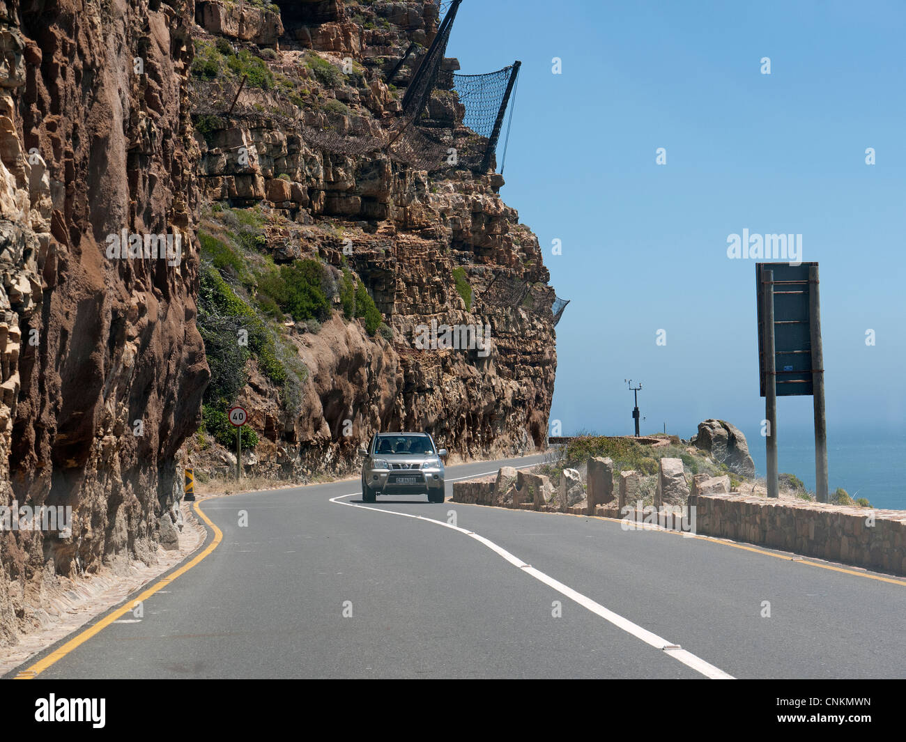 Chapman's Peak Drive showing nets to catch falling rocks Western cape S ...