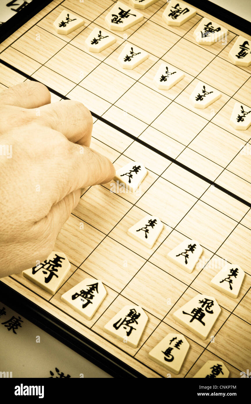 playing a game of Japanese chess, Shogi Stock Photo