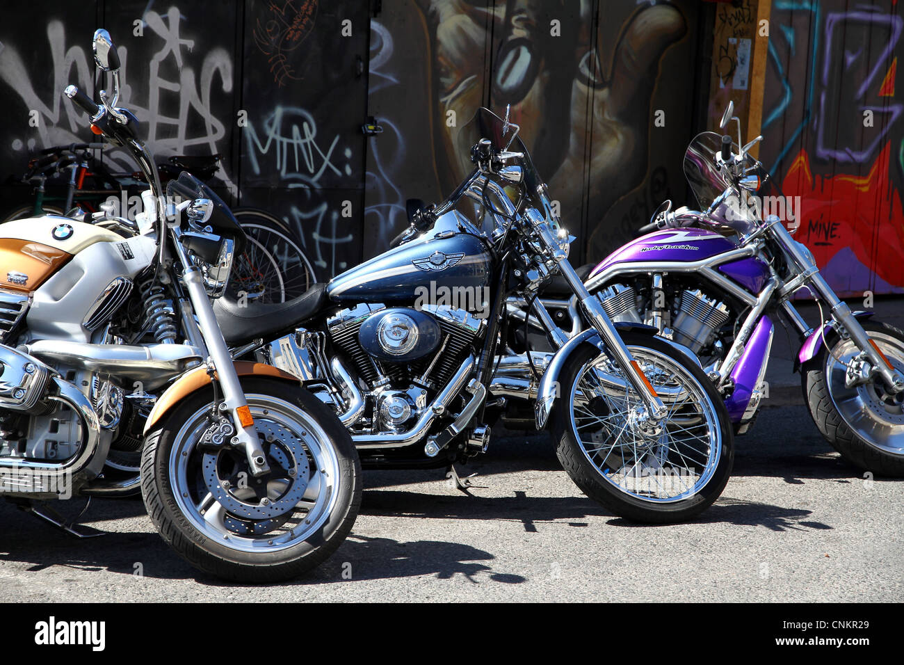 Three Harley-Davidson in a city street Stock Photo