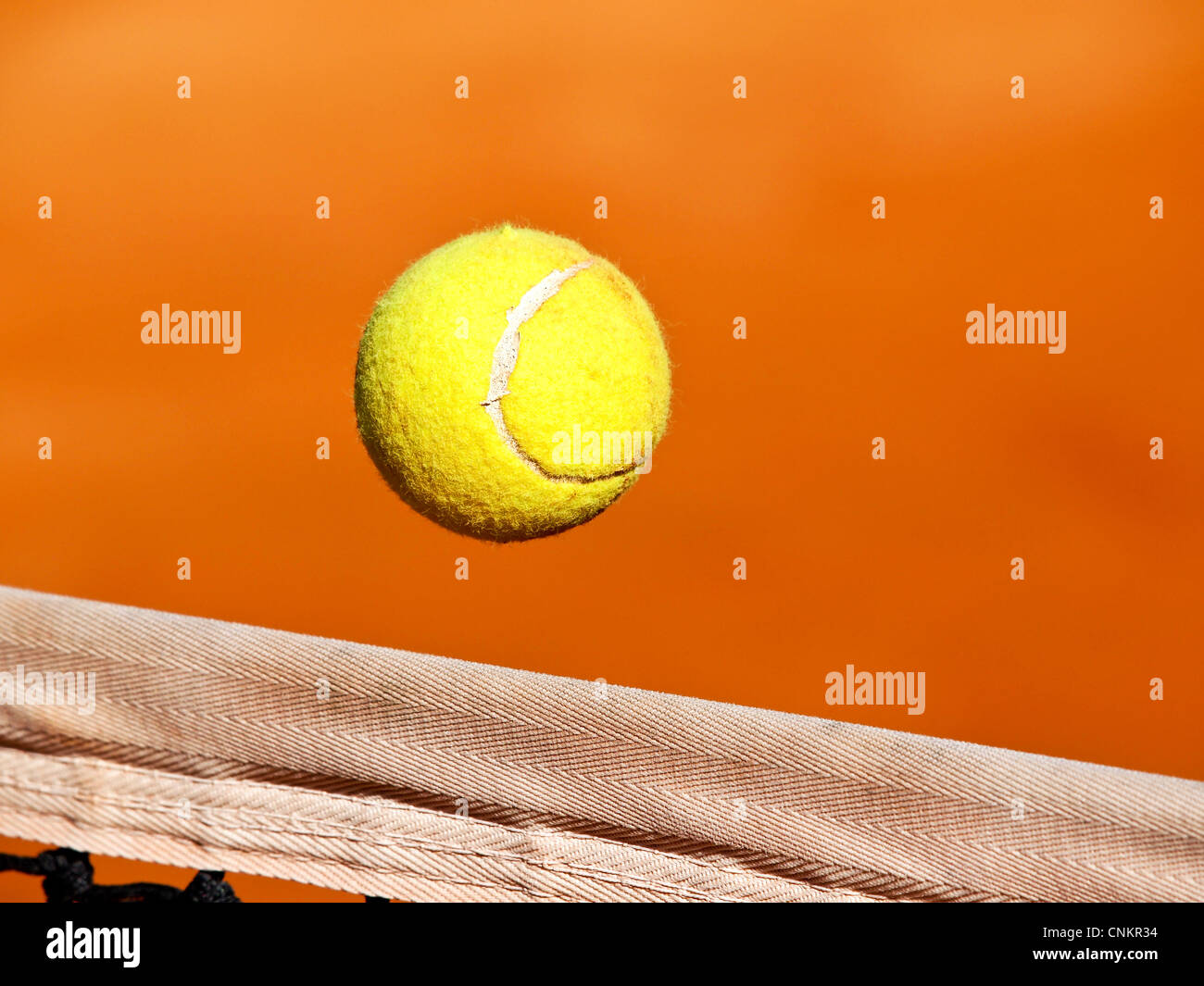 tennis ball over the net Stock Photo Alamy