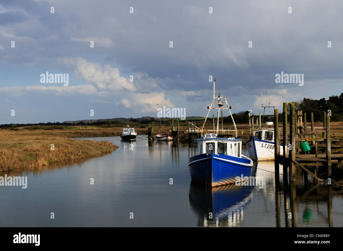 Boats in Thornham Harbour, Norfolk, England, UK Stock Photo