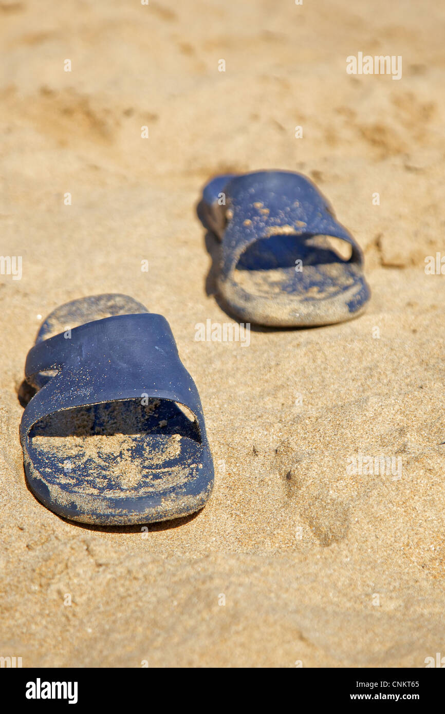 Sandals at beach Stock Photo
