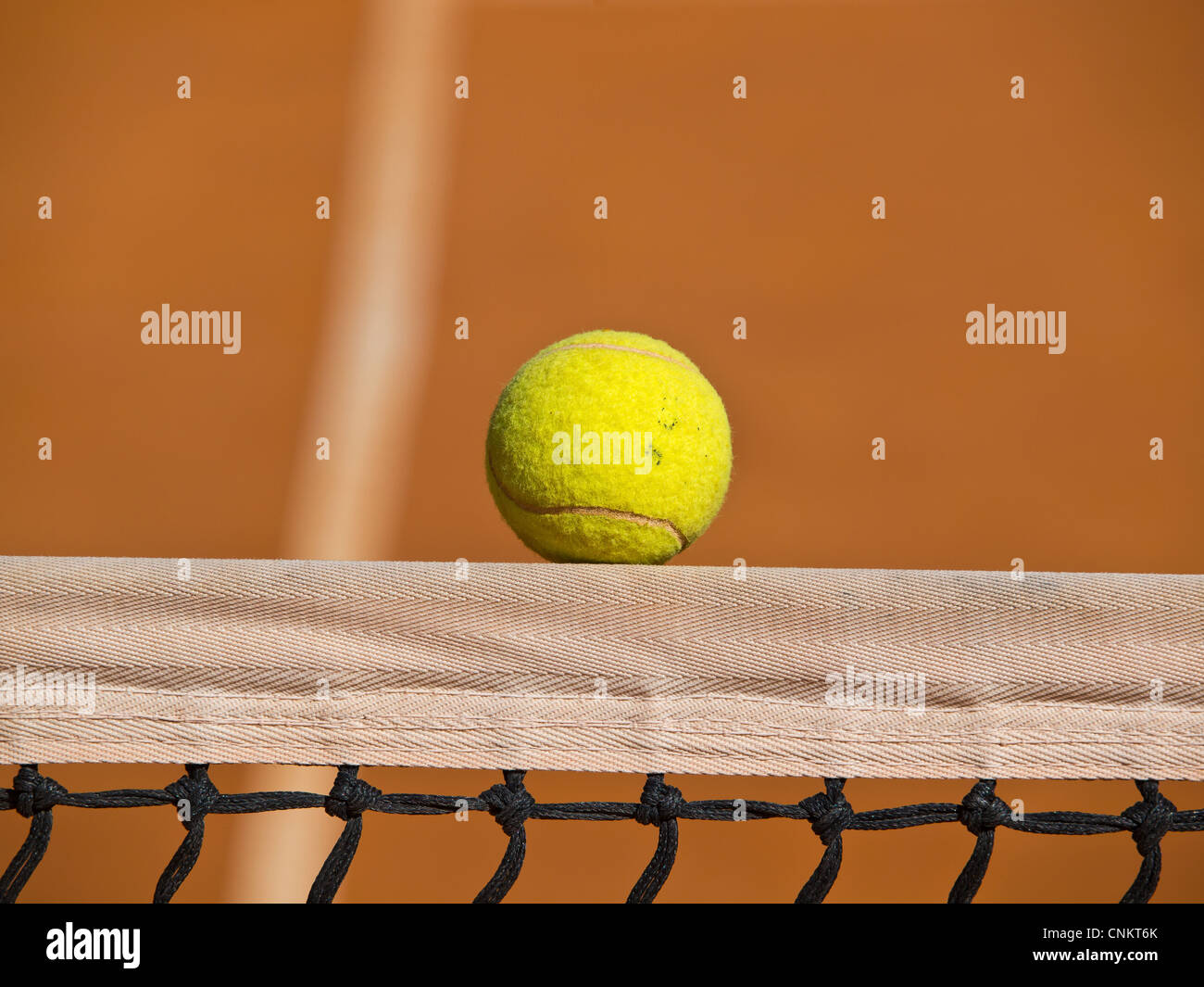 tennis ball over the net Stock Photo Alamy