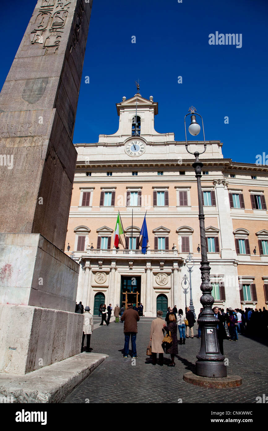 City view of Rome, Italy with old buildings, monuments, art. Palazzo Montecitorio, the seat of the Italian Chamber of Deputies Stock Photo