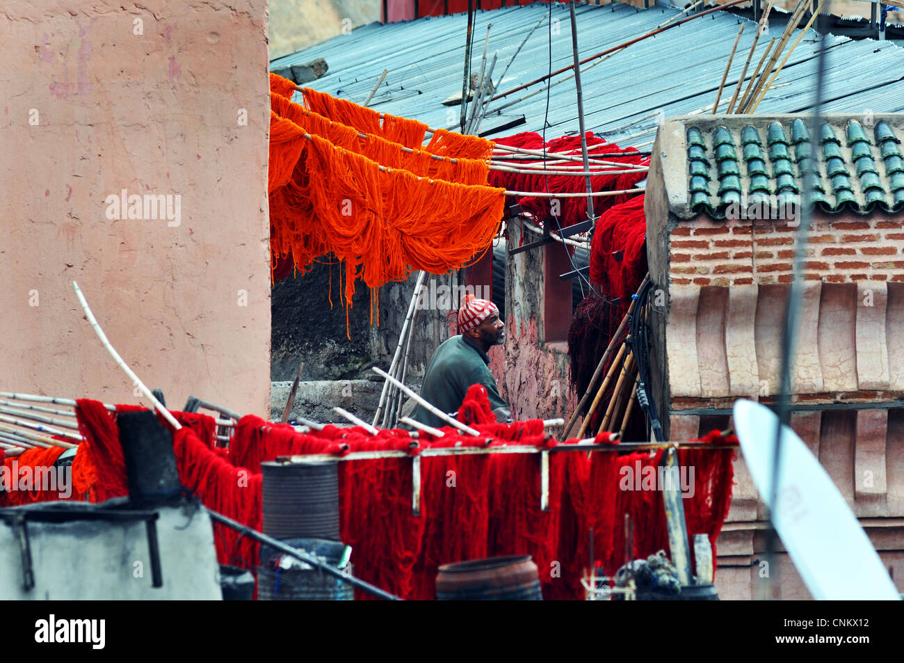 Traditional Wool dye process in the Souks of Marrakesh, Morocco Stock Photo