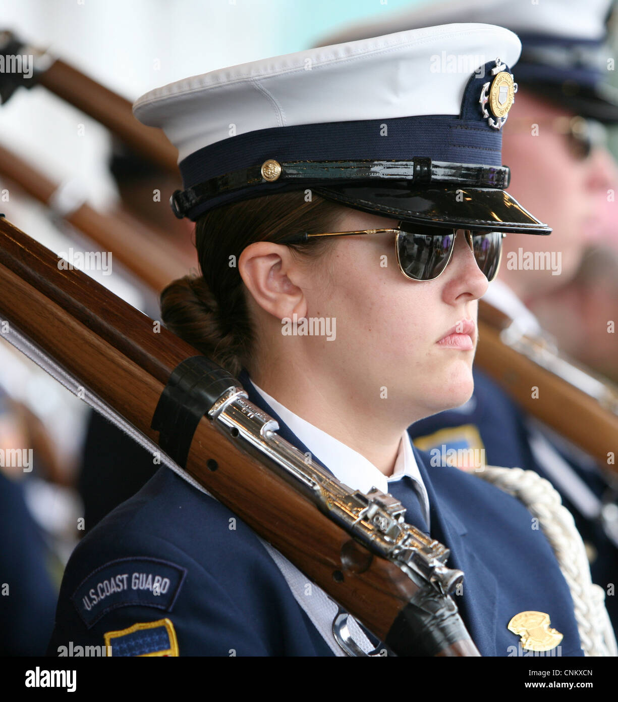 Seaman Emily Greenhouse, a member of the U.S. Coast Guard Honor Guard, performs during the The War of 1812 Bicentennial Commemoration in New Orleans. The events are part of a series of city visits by the Navy, Coast Guard, Marine Corps and Operation Sail beginning in April 2012 and concluding in 2015. New Orleans is the first and the last city visit in the series. Stock Photo