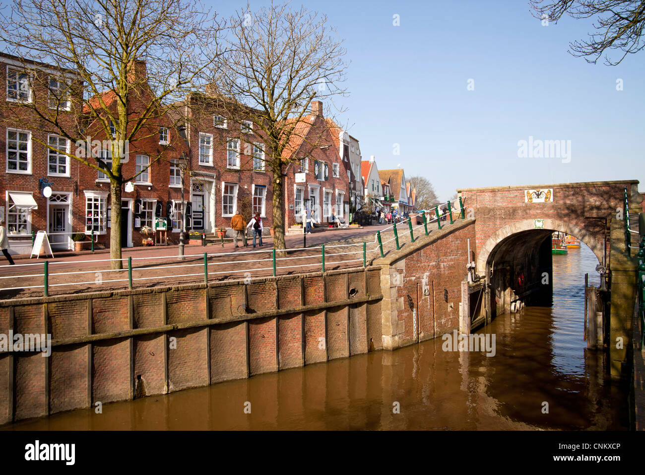 Siel and fishermen's cottages in Greetsiel, East Frisia, Lower Saxony, Germany Stock Photo