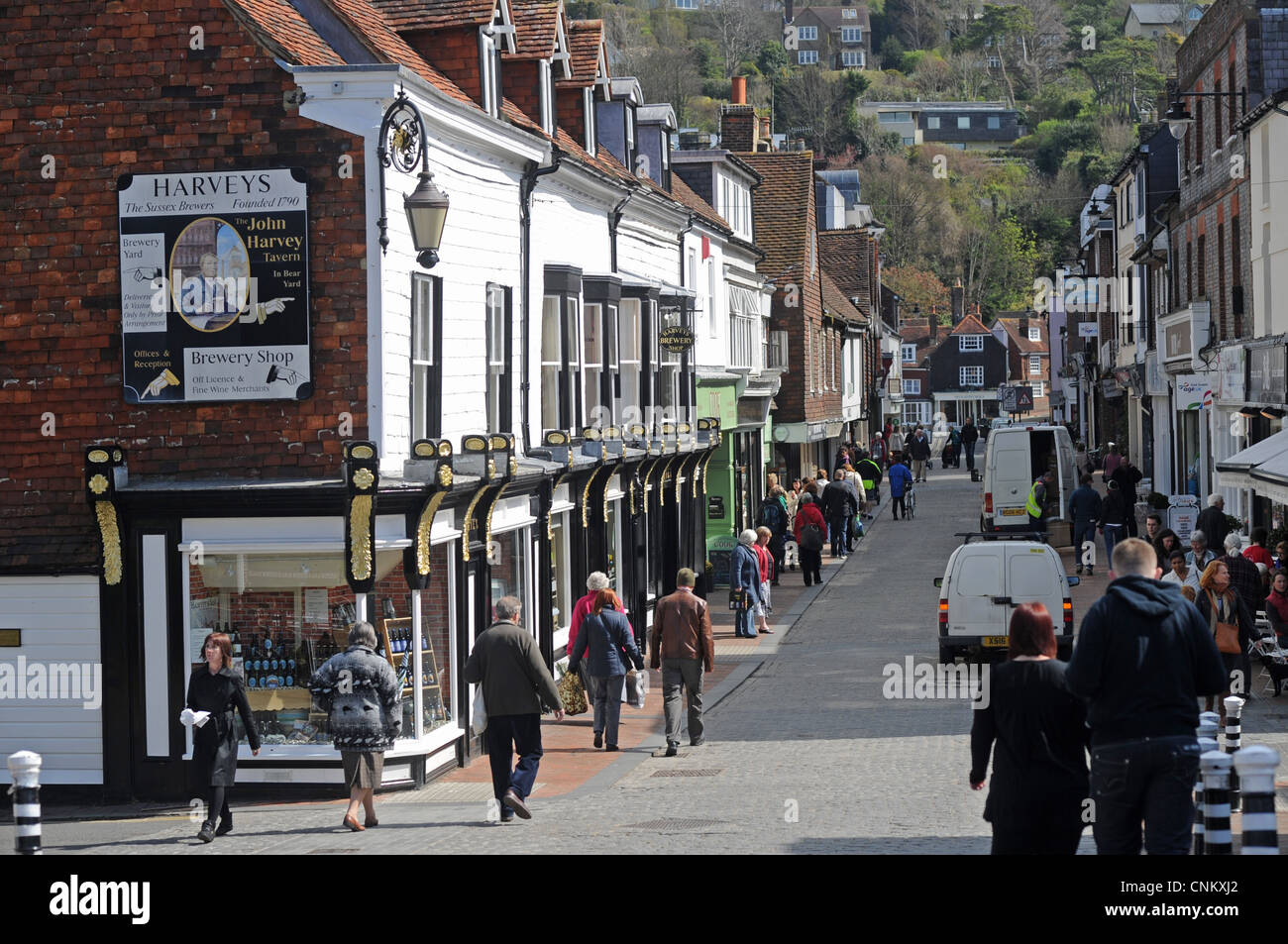 Lewes Town Centre East Sussex UK - Cliffe High Street with the famous harveys Brewery shop on left Stock Photo