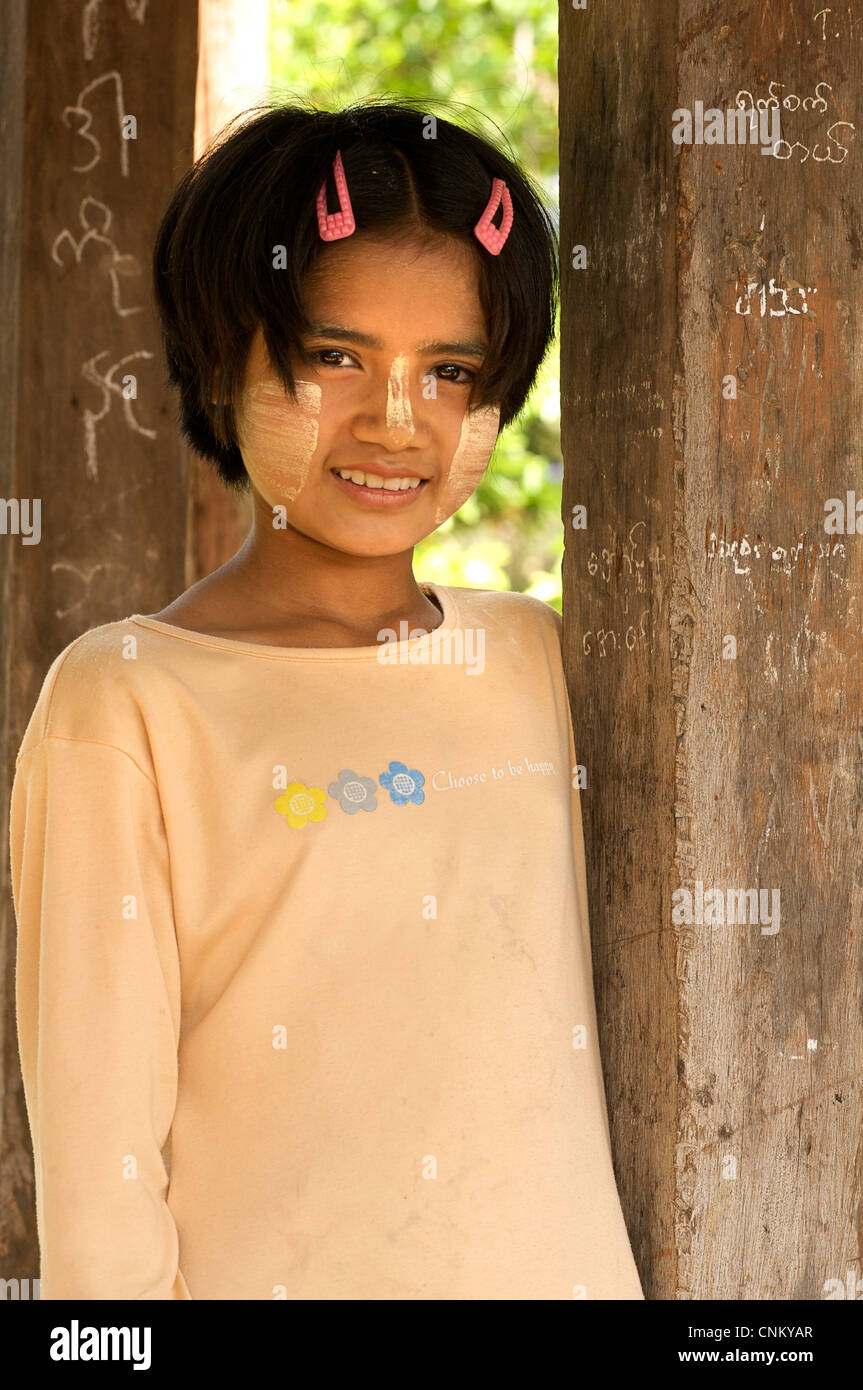 Portrait of Burmese girl with thanaka painted face. A distinctly Burmese cultural expression. Kalaw, Burma Myanmar Stock Photo