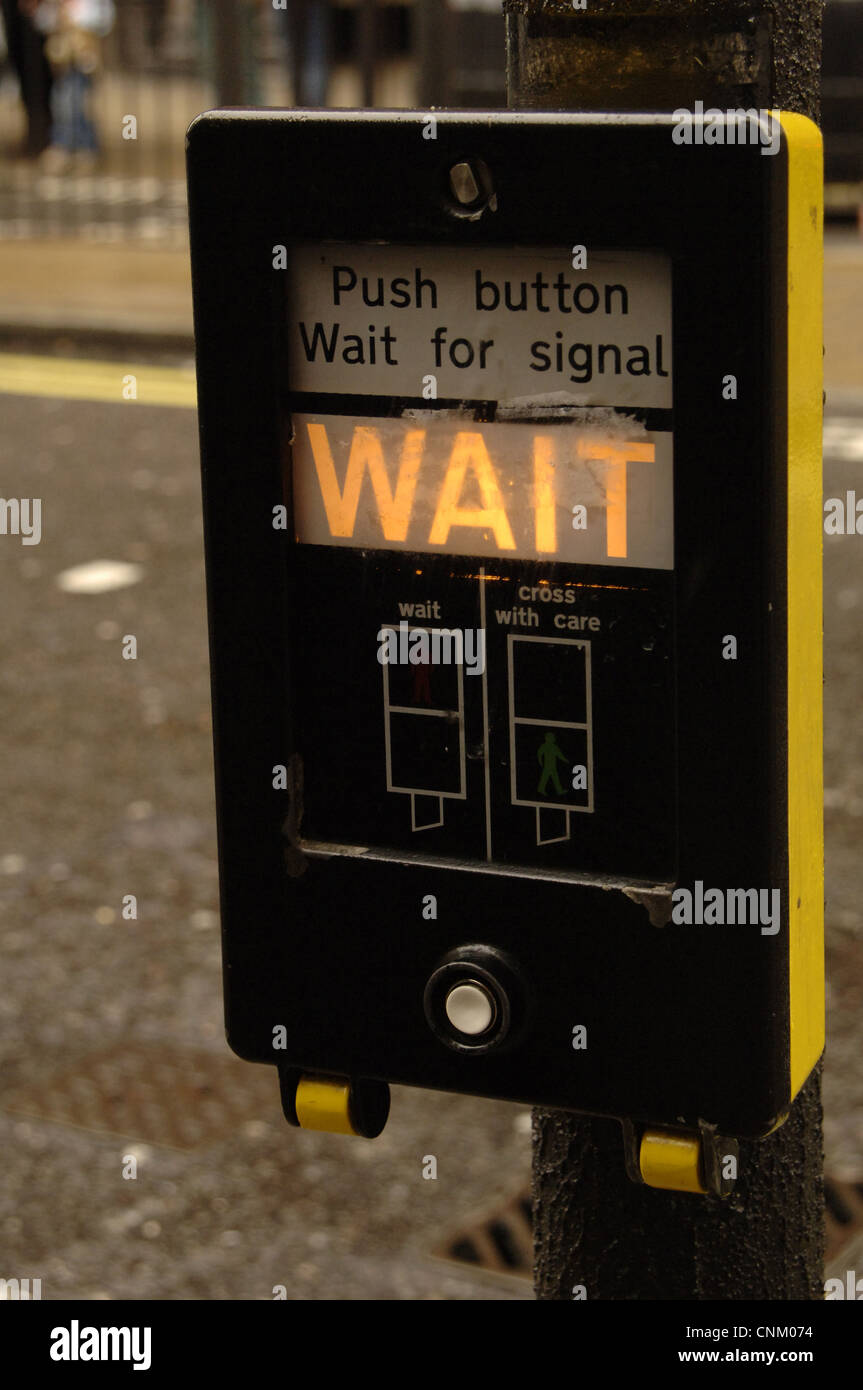 United Kingdom. London. Pedestrian traffic light switch indicating that they must wait to cross