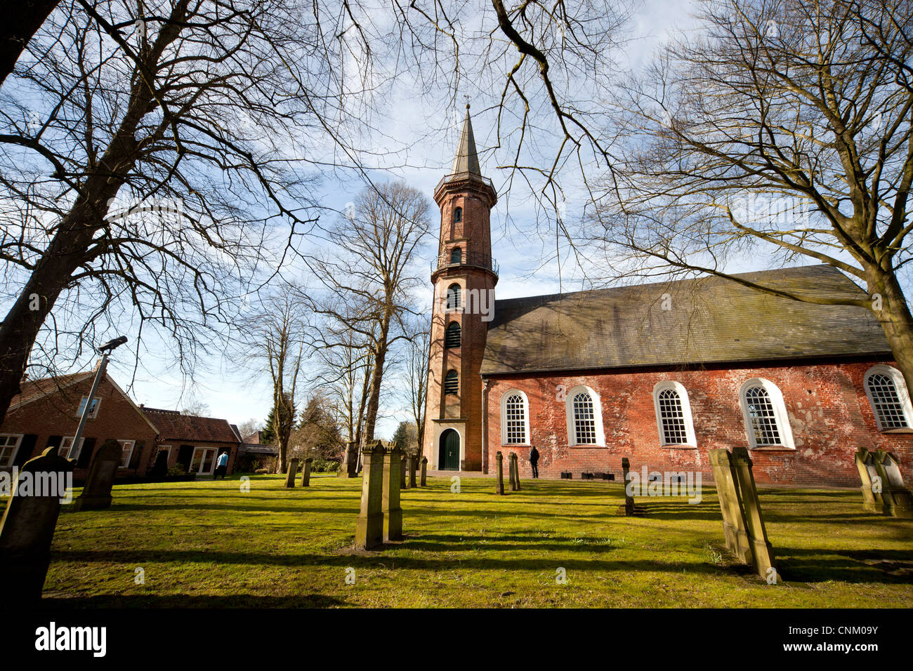 church Friedenskirche and cemetery in Leer , East Frisia, Lower Saxony, Germany Stock Photo