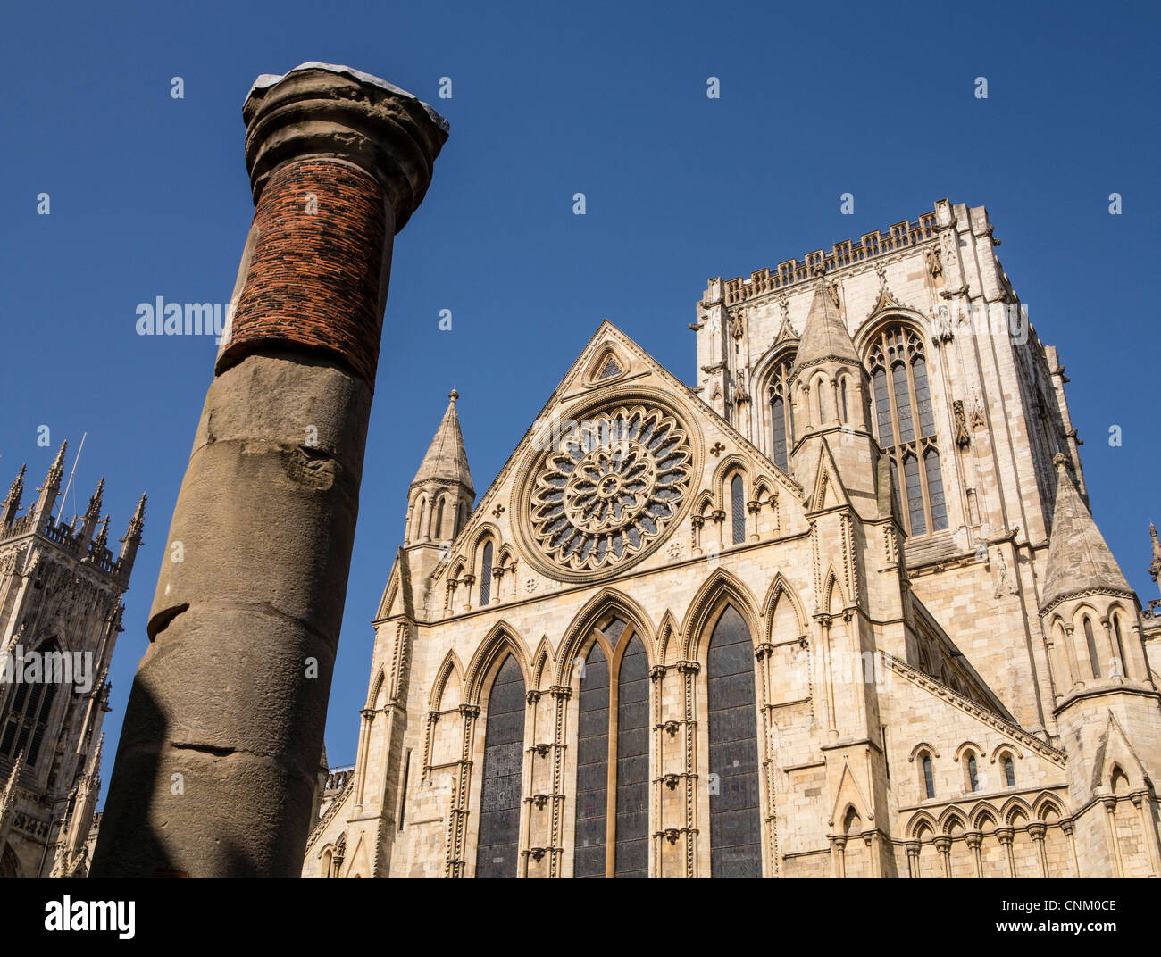 Rose Window, Central Tower and Roman Column York Minster UK Stock Photo