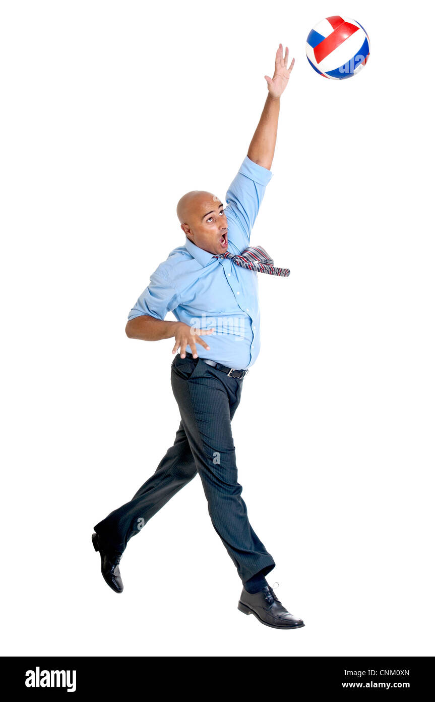 Businessmen playing volley isolated Stock Photo Alamy