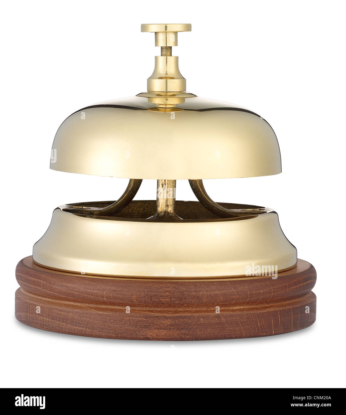 a brass hotel bell low angle on white with clipping path Stock Photo