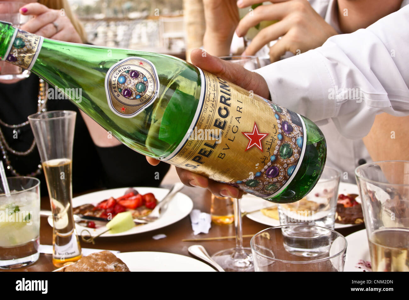 A Bulgari branded bottle of San Pellegrino sparkling mineral water   Park Hyatt Hotel, Dubai Creek, Dubai, United Arab Emirates Stock Photo