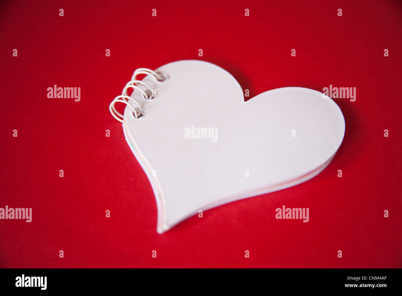 Heart shaped notebook Stock Photo