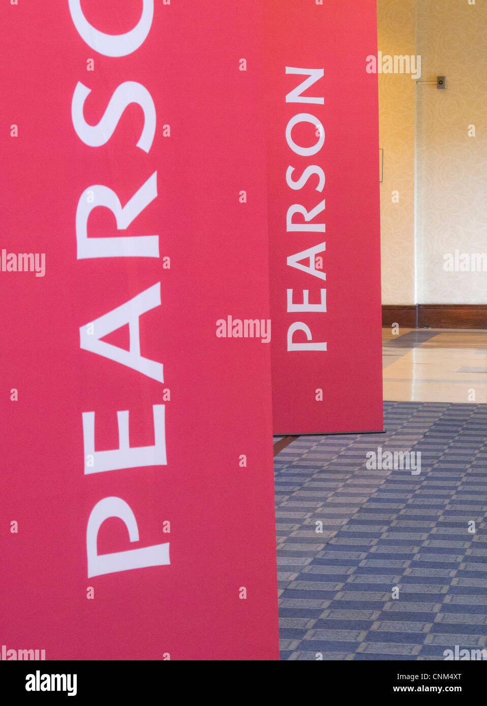 Pearson signs at a business conference Stock Photo Alamy