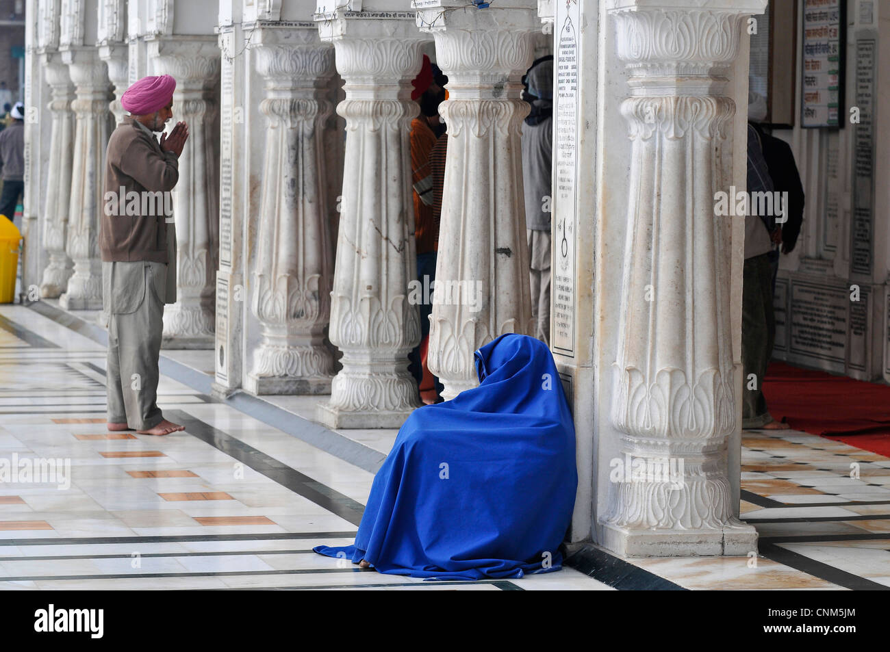 People inside golden temple hi-res stock photography and images - Alamy