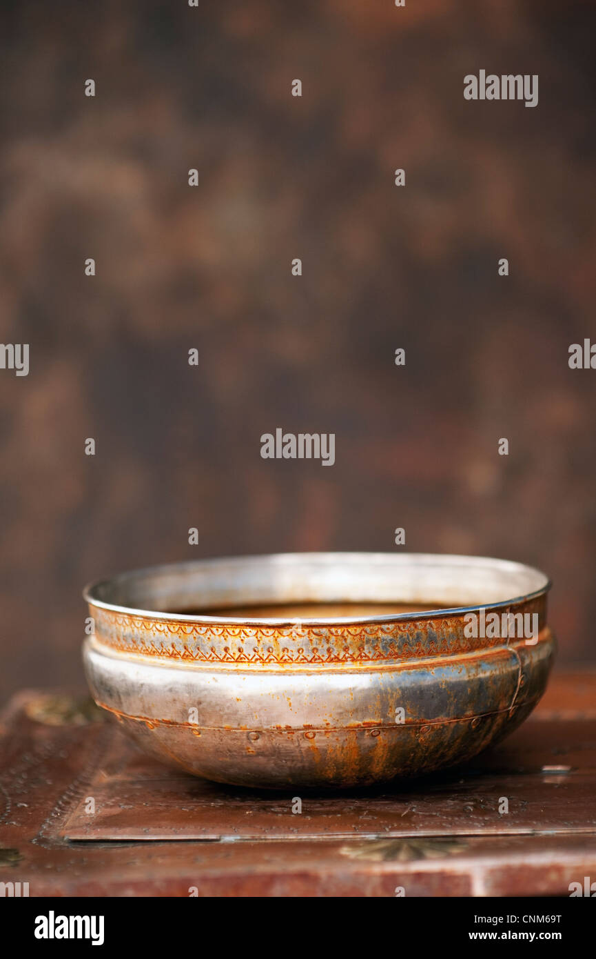 Rusted wash basin from India. Stock Photo