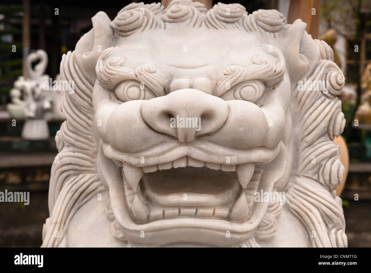 Stone carving of a lion, Hai Duong, Vietnam Stock Photo