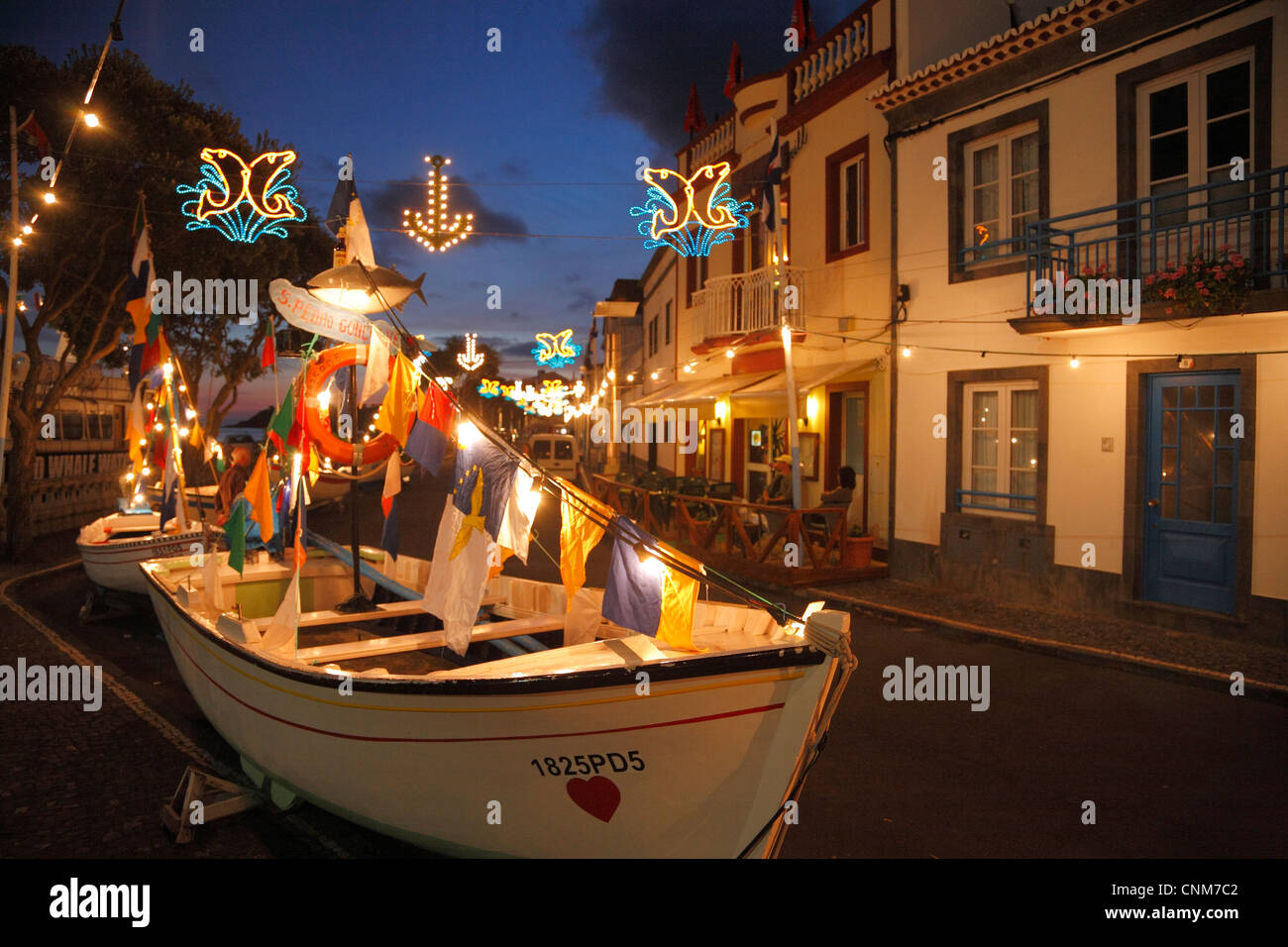 Decorated fishing boats during fishermen's fest Festa do Irró. Vila Franca do Campo, Azores islands, Portugal. Stock Photo