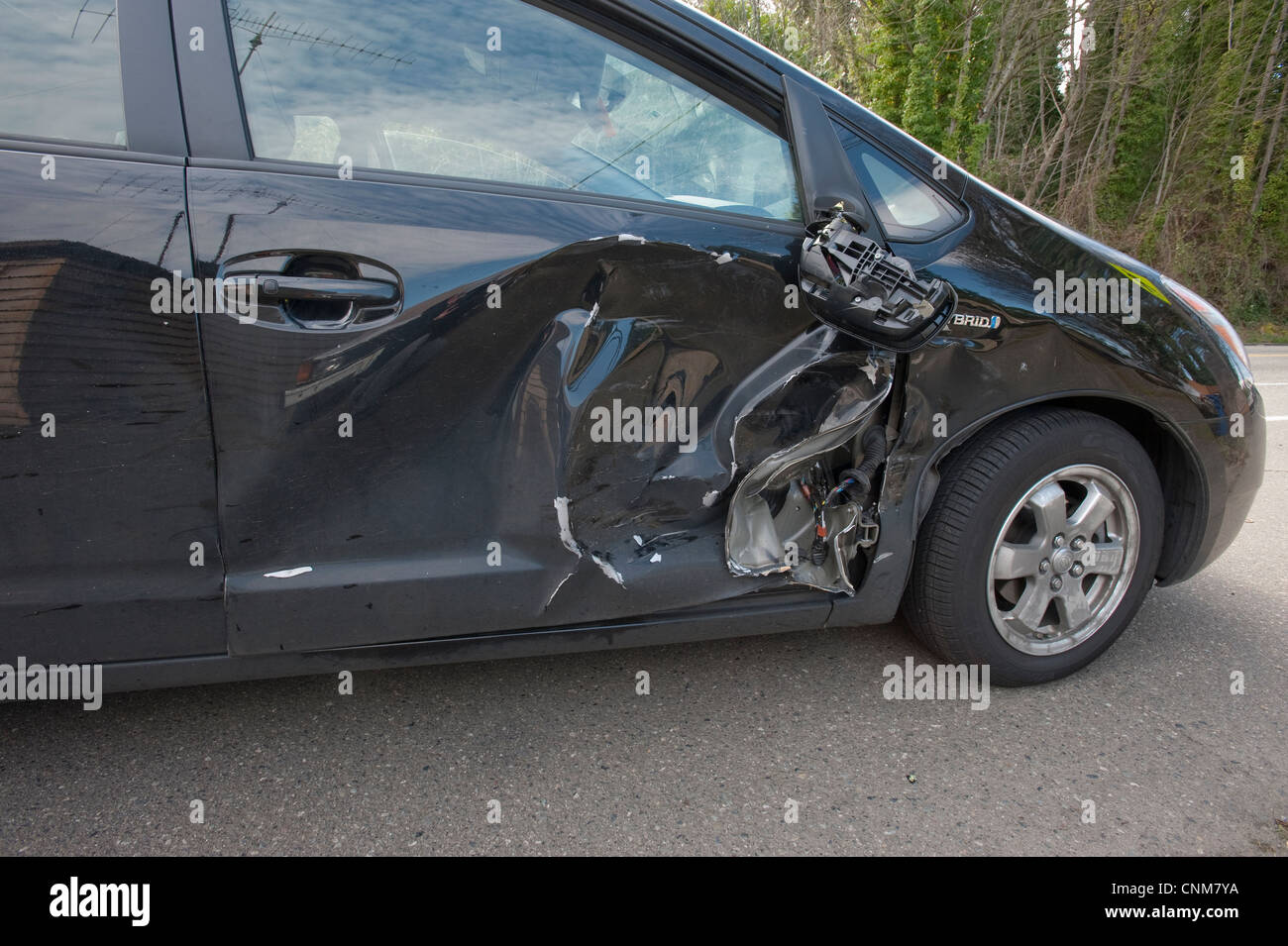 Toyota Prius sustaining damage after accident. Stock Photo