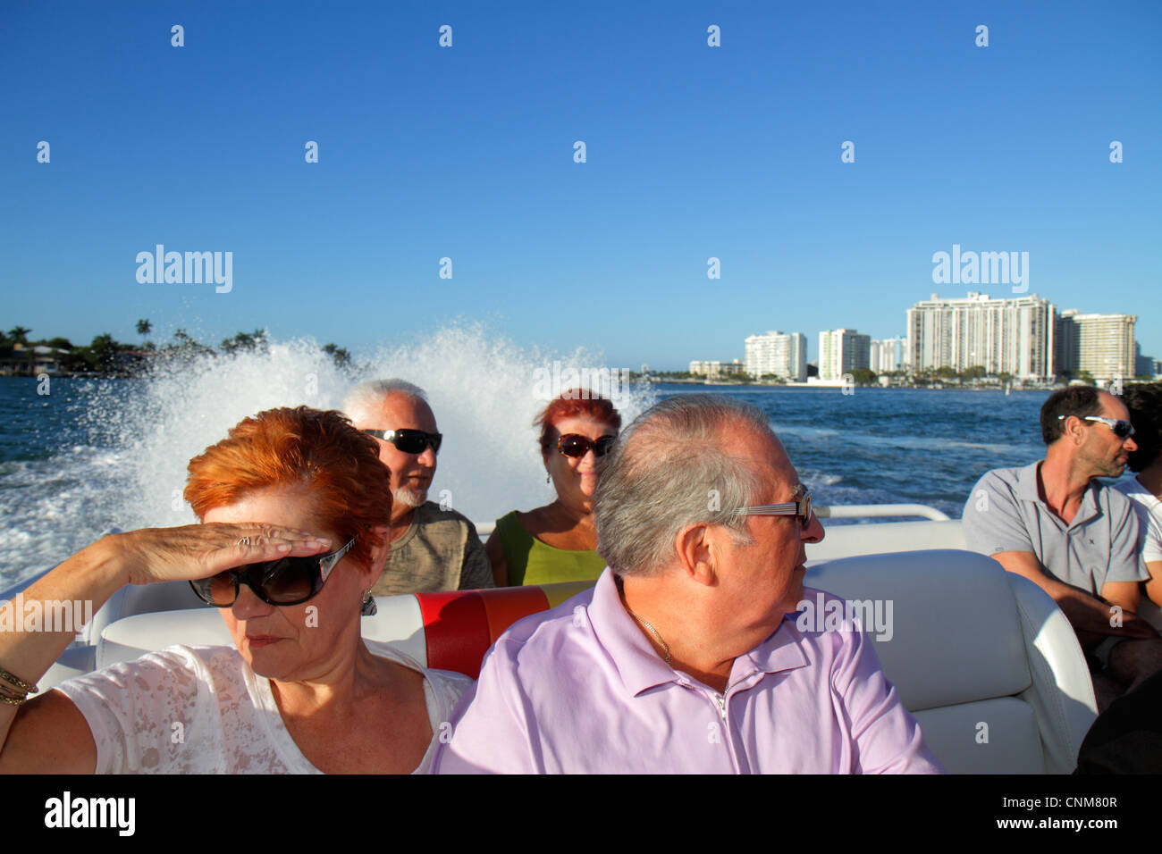 Miami Beach Florida,Biscayne Bay,Thriller Speedboat tour,senior seniors citizen citizens,man men male,woman female women,couple,FL120311102 Stock Photo