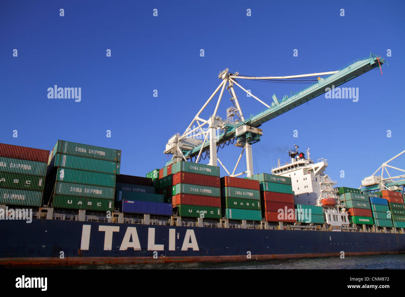 Miami Florida,Biscayne Bay,Dodge Island,Port of Miami,cargo container lift cranes,ship,FL120311127 Stock Photo