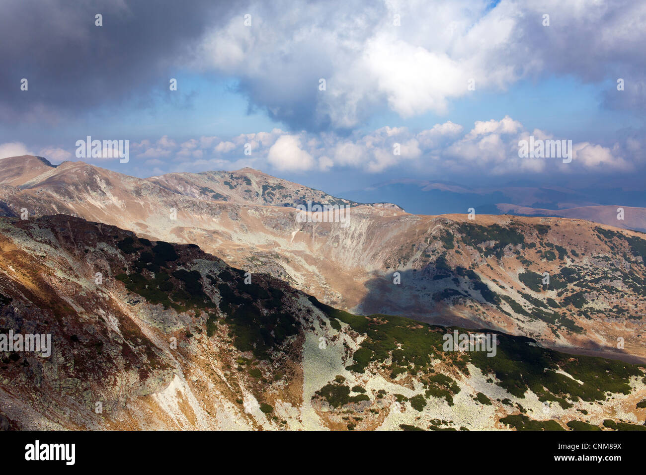 Landscape with mountains and clouds Stock Photo - Alamy