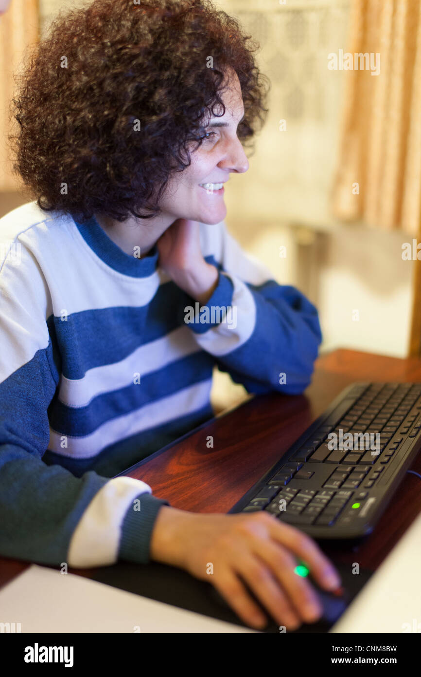 Closeup portrait of a woman at her computer Stock Photo - Alamy
