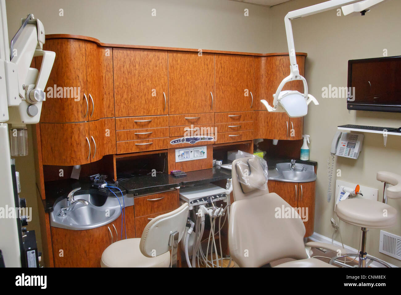 Dentist Examination Room with Empty Chair Stock Photo