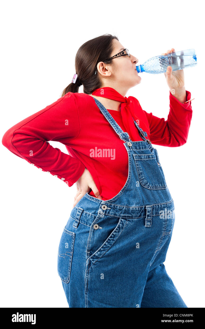 Preganant woman with a bottle of water isolated on white background Stock Photo
