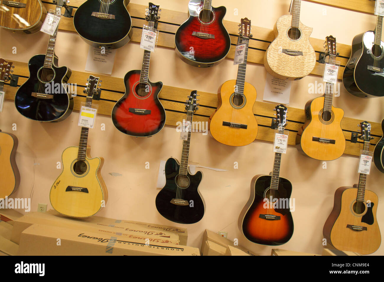 Miami Florida,Sweetwater,Dolphin Mall,Sam Ash Music,musical instruments,acoustic guitars,display case sale,shopping shopper shoppers shop shops market Stock Photo