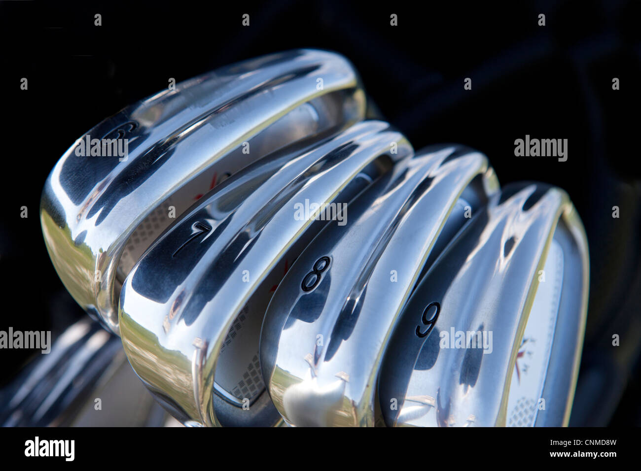 Irons in a golf bag Stock Photo Alamy