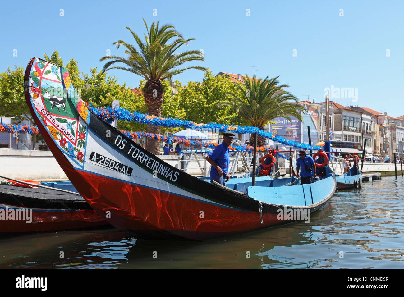 The crew prepares a colourful Moliceiro boat for a sightseeing tour along the canals of Aveiro, Beira Litoral, Portugal, Europe Stock Photo