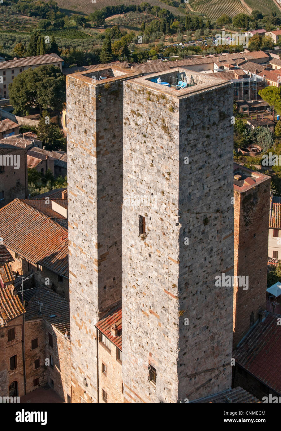 Torri dei Salvucci (Twin Towers ot Torri Gemelle) at Piazza del Duomo as seen from Torre Grossa, San Gimignano, Tuscany,  Italy Stock Photo