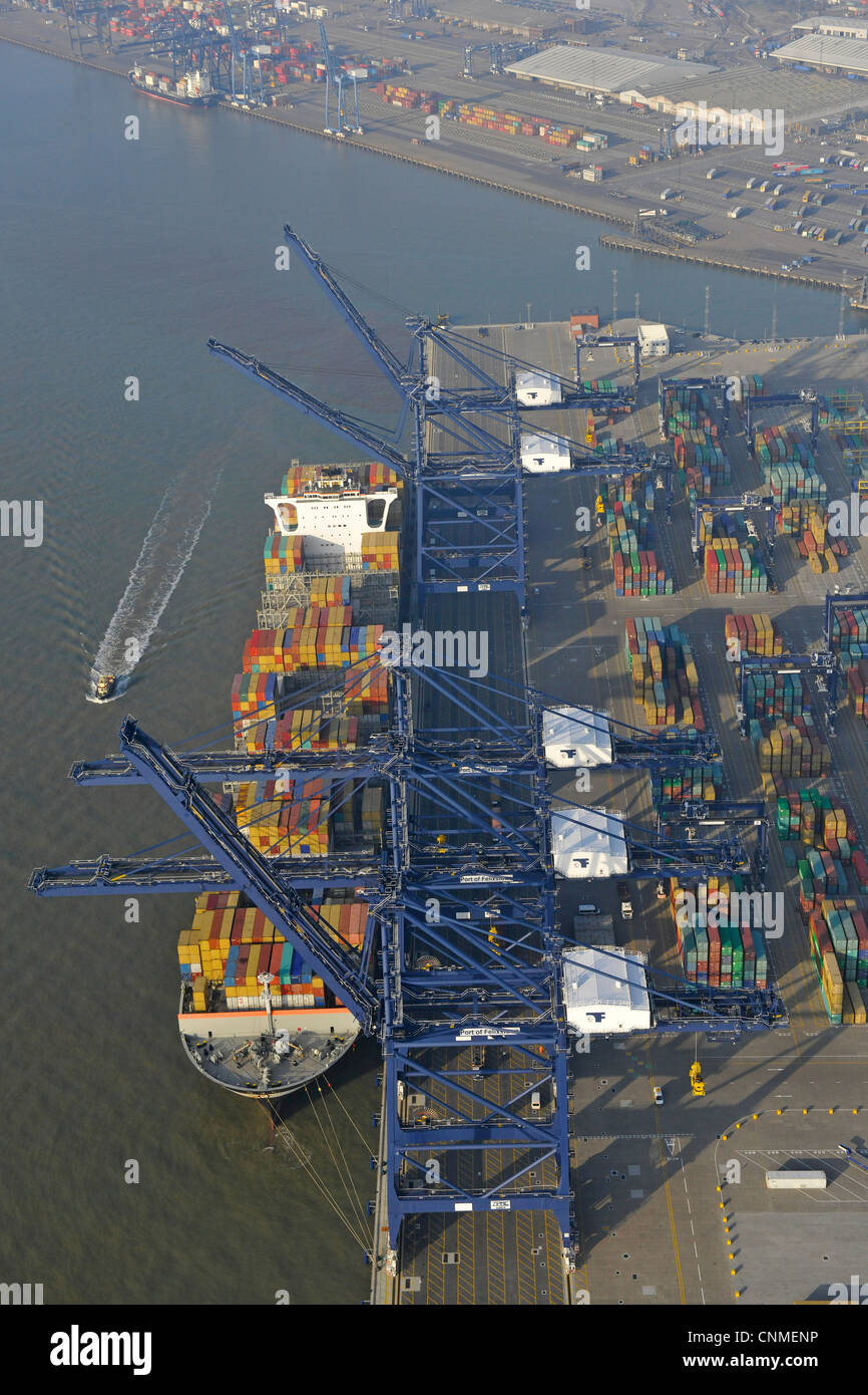Aerial photograph showing Felixstowe docks with ship in port, cargo containers and cranes. Stock Photo