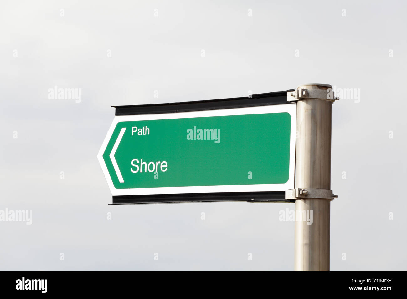 Direction sign pointing to a shore path between Portencross and West Kilbride in North Ayrshire, Scotland, UK Stock Photo