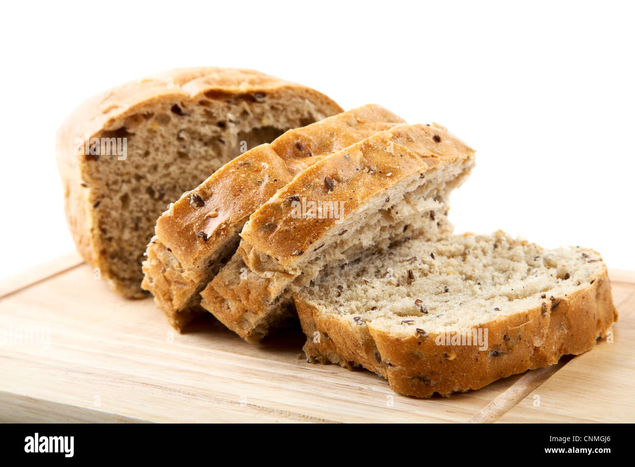 The cut bread on a chopping board isolated Stock Photo