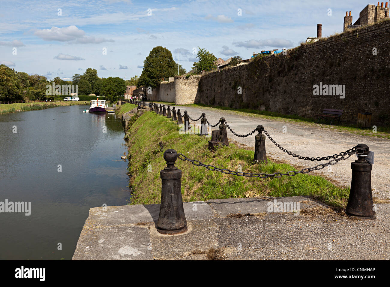 River Colne and defensive wall through town of Bergues to create defences, Nord, France Stock Photo