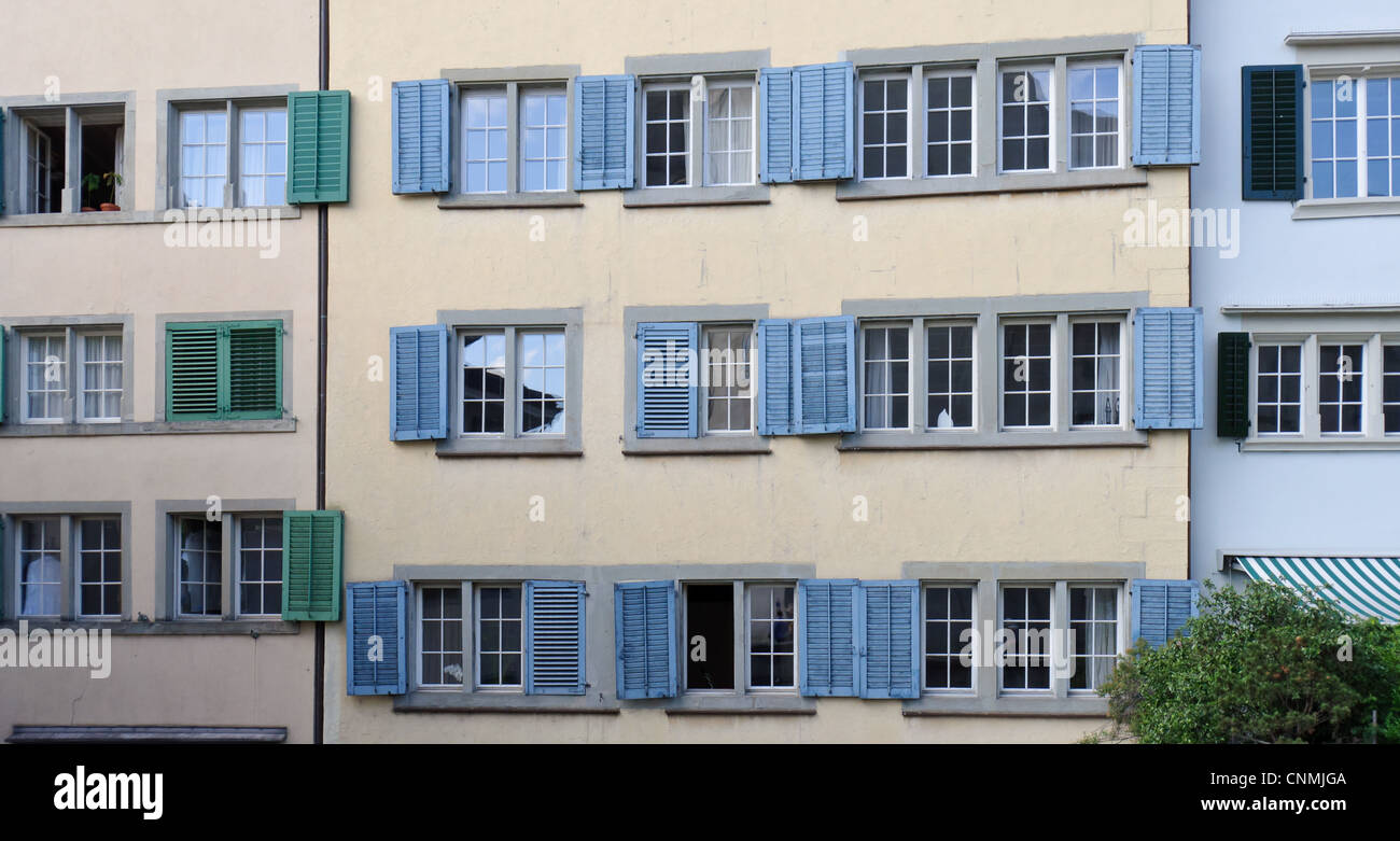 Small colored window shutters. Stock Photo