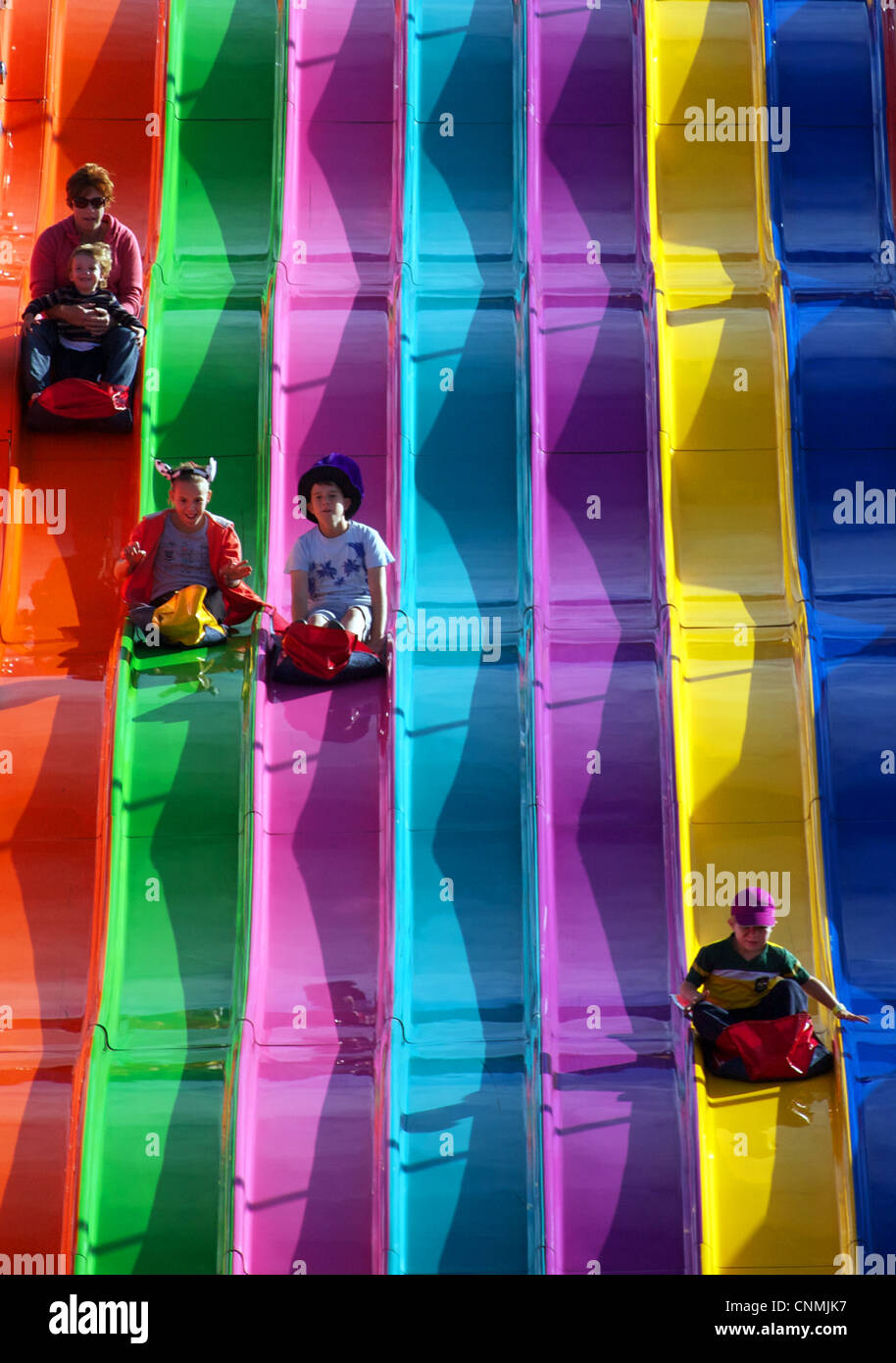Colourful slippery slide fun Stock Photo Alamy