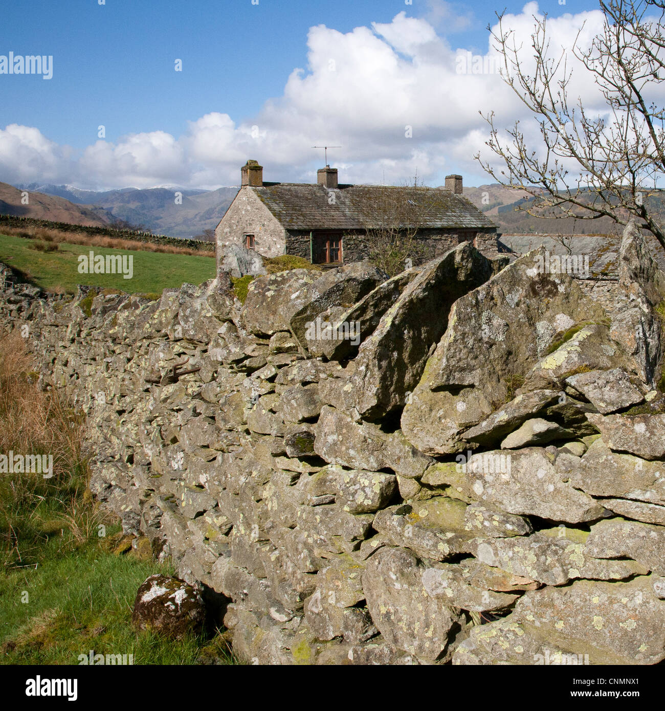 Traditional Dry Stone Wall And Cottage In Ullswater In The Lake
