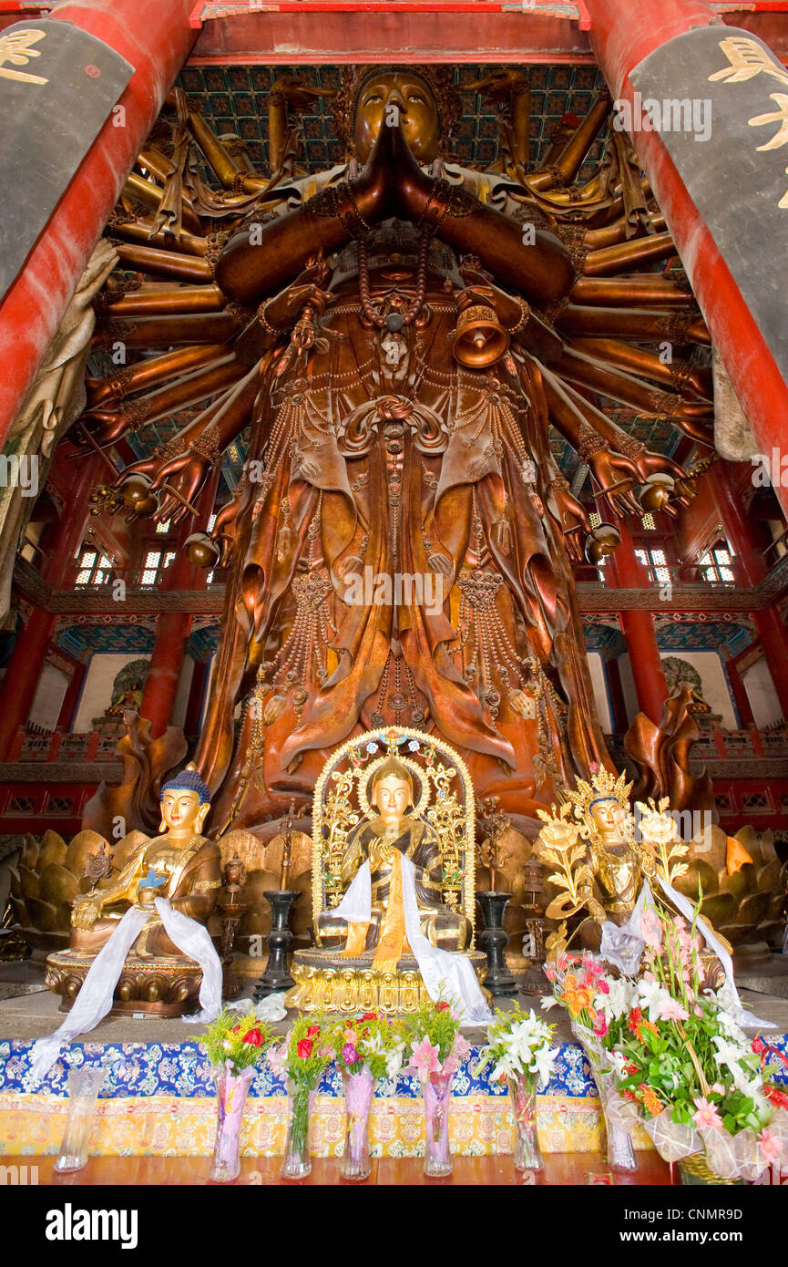 The giant wooden Bodhisattva Avalokiteśvara inside the Grand Hall of Mahayana at the Puning Temple in Chengde. Stock Photo