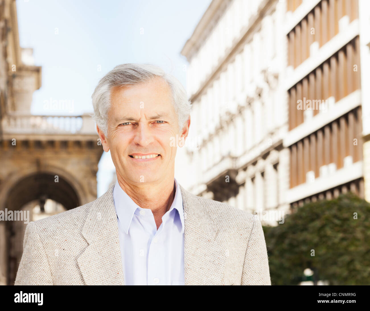 Close up of businessman’s smiling face Stock Photo
