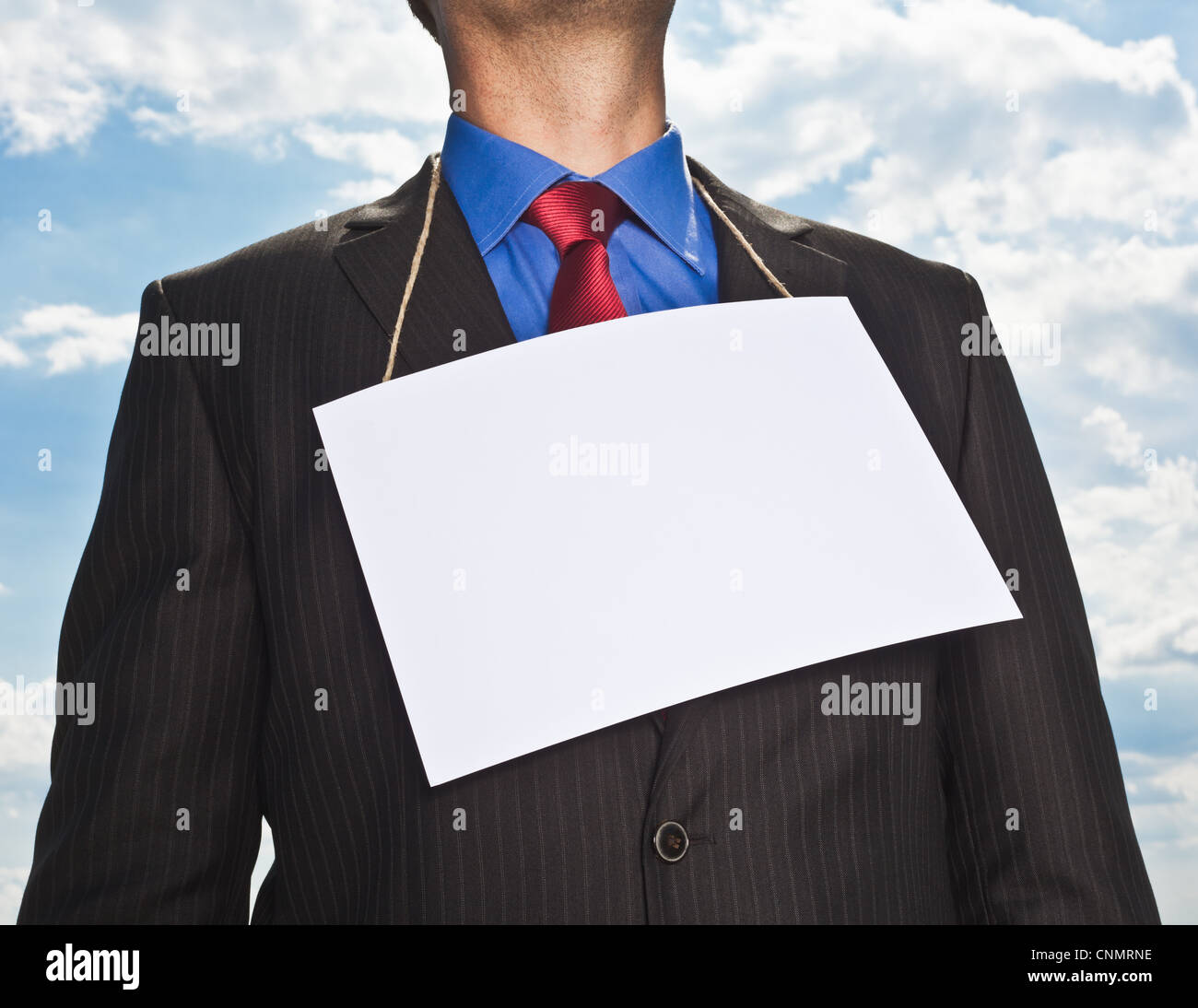 Businessman wearing blank card Stock Photo