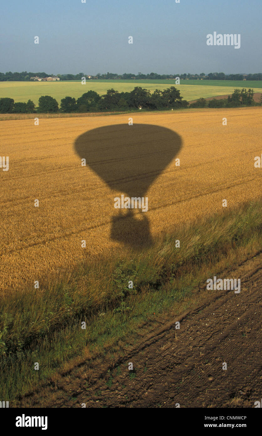 Sunlight Shadow of balloon over farmland Stock Photo