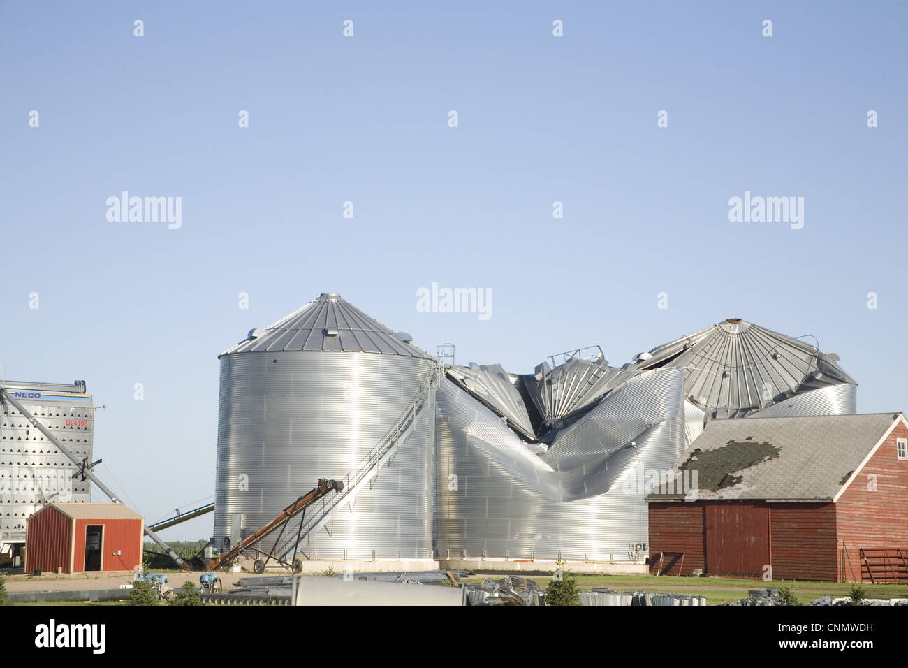 Tornado storm damage to grain bins on farm, Oakes, North Dakota, U.S.A